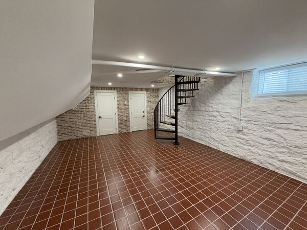 Unit 2 basement with spiral staircase