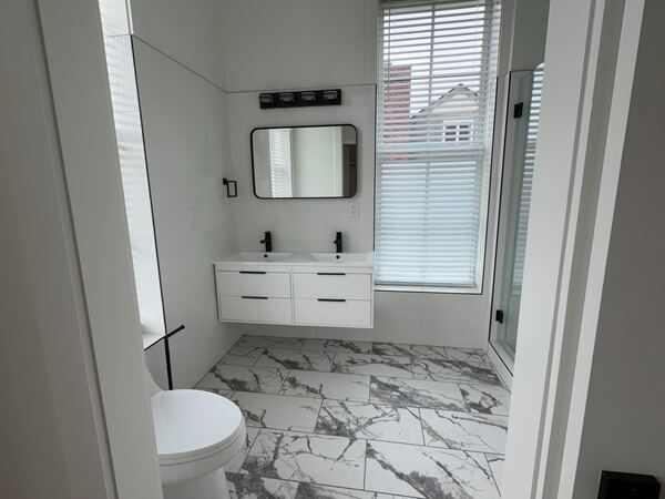 Unit 3 bathroom with dual vanity