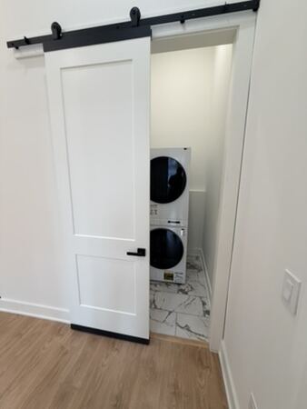 Unit 7 living space with exposed brick